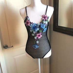 Elegant fishnet onesie